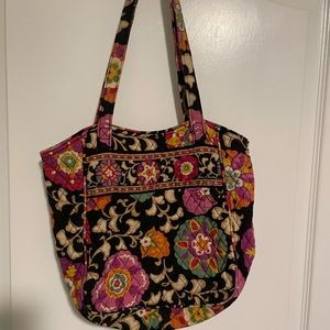 Vera Bradley bag. Black with flowers. Open purse meaning to snap or zipper.